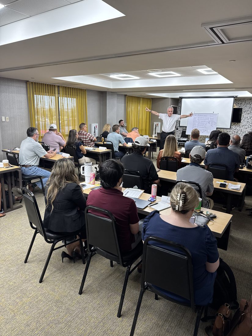 Keith Wagner leading a full classroom at the Life Insurance Training